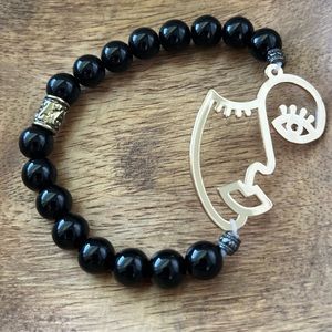 Handmade beaded black women bracelet with gold face charm